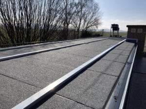 It shows the flat roof of the pumping station, which is yet to be equipped with solar panels