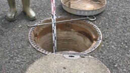 A manhole is measured