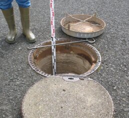 A manhole is measured